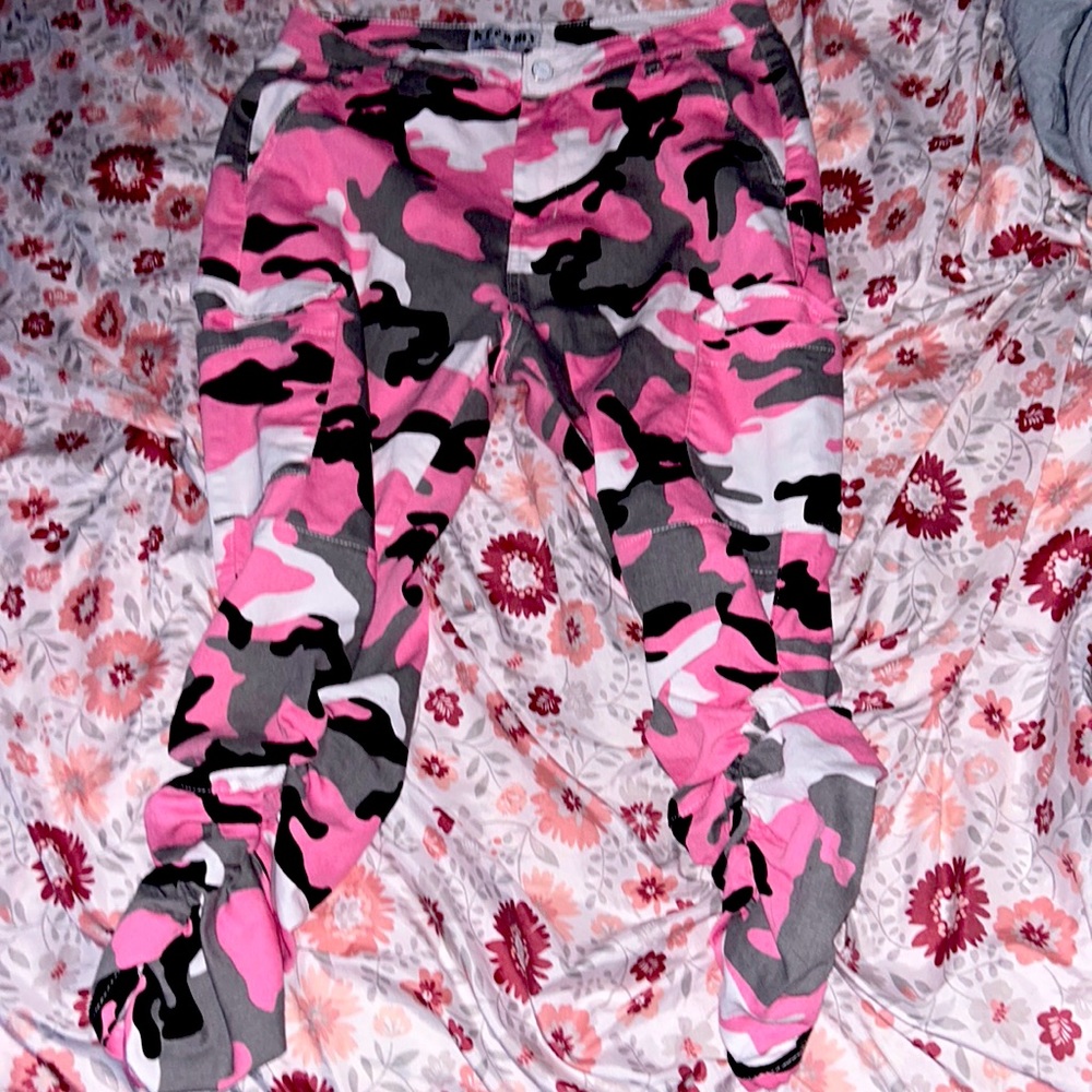 Scrunched up pink white and black army print pants